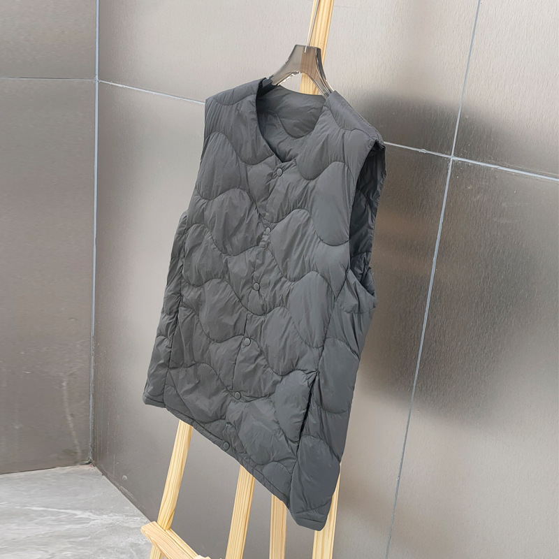 سترة بيضاء خفيفة للغاية مبطنة  - مراجعة Down Vest Ultralight وسعره