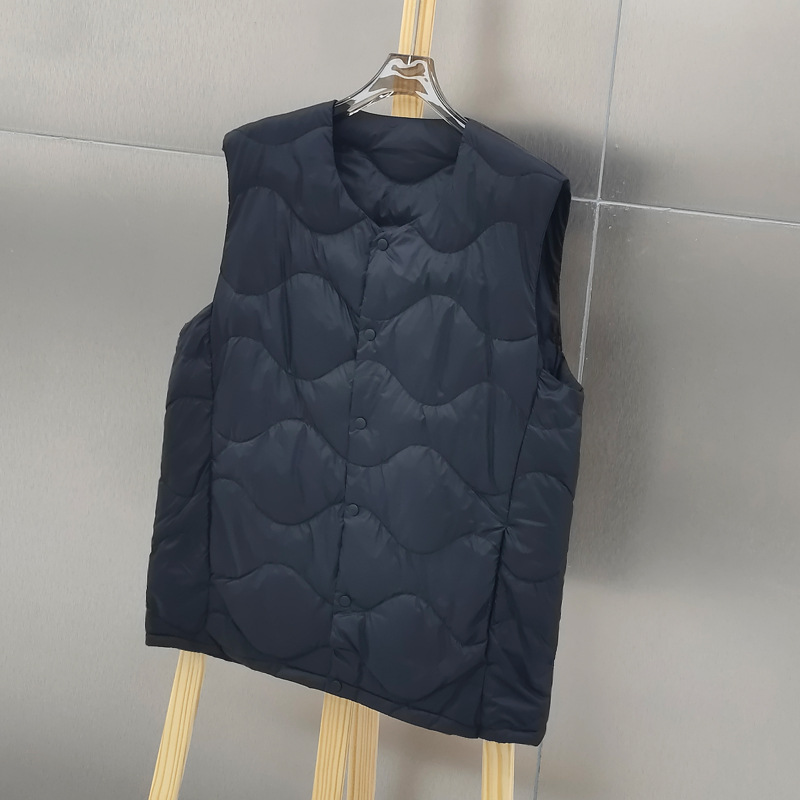 سترة بيضاء خفيفة للغاية مبطنة  - مراجعة Down Vest Ultralight وسعره