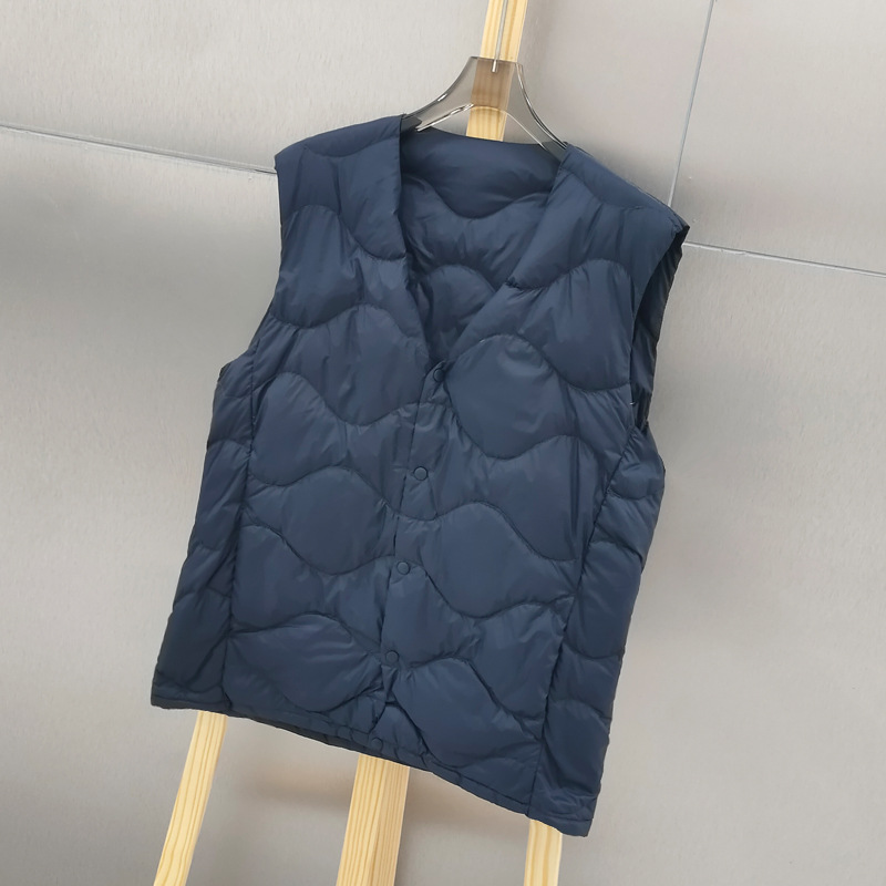 سترة بيضاء خفيفة للغاية مبطنة  - مراجعة Down Vest Ultralight وسعره